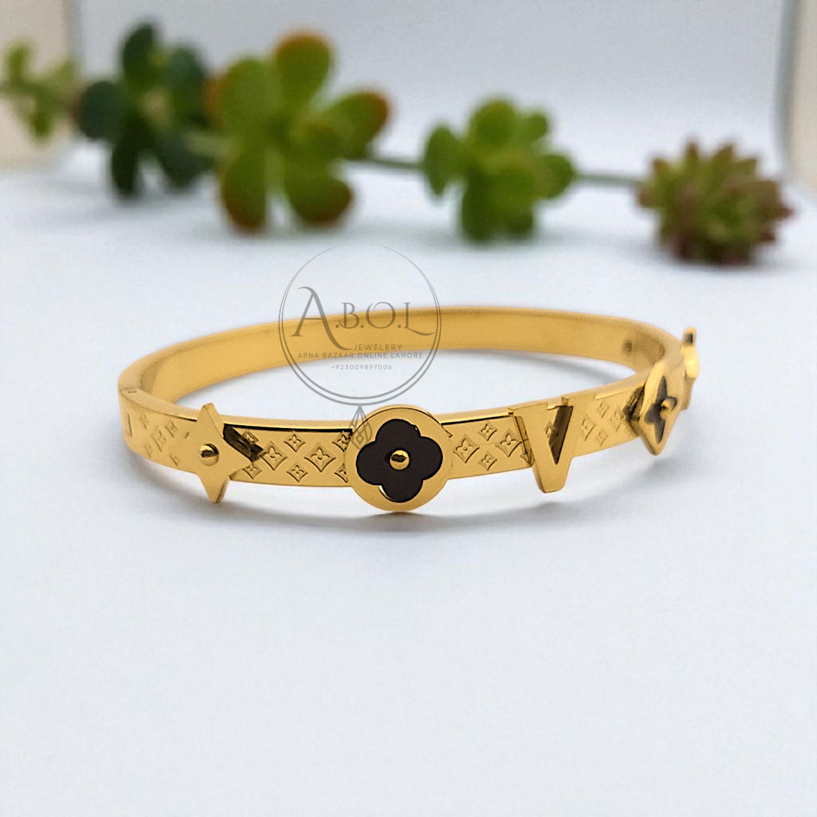 LV Golden Stainless Steel Openable Handcuff – Luxury with Strength - Image 2